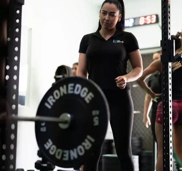 Women's Gym in Perth Coach helping her trainee